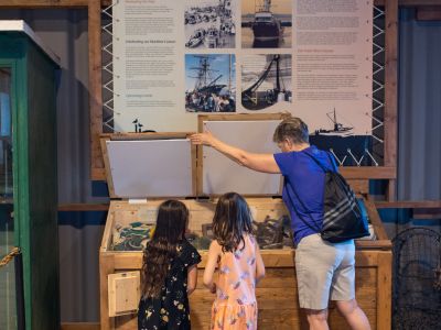 Woman and 2 children learning about Steveston's history